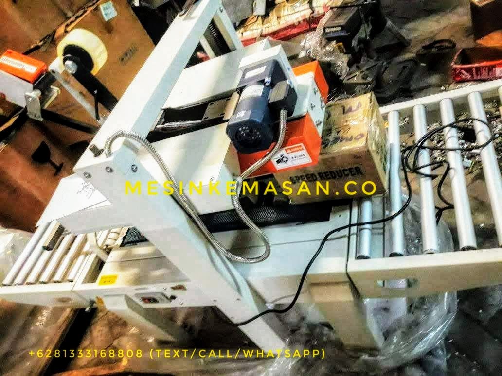 mesin karton sealer FXJ 6050 1